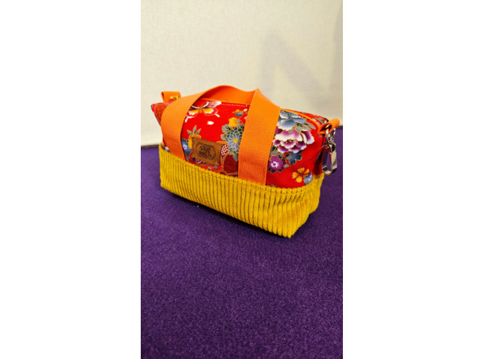 Mini sac maxi trousse