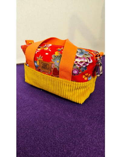 Mini sac maxi trousse